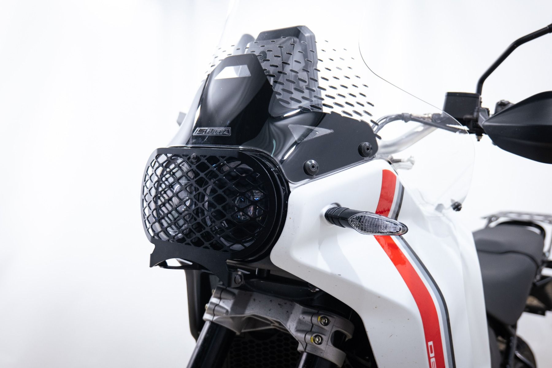 Griglia di protezione del faro per Ducati DesertX, nera
